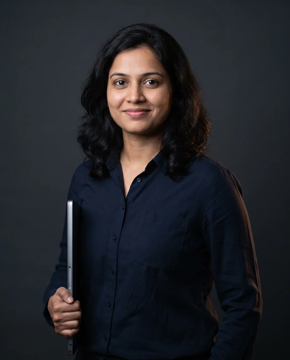AI INST agent engineer holding a laptop